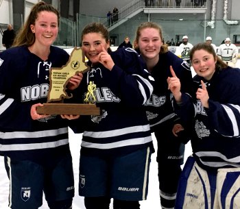 The Nobles captains -- Katie Tresca, Abby Volo, Steph Nomicos, and Kelly Pickreign -- celebrate their 2018 NEPSAC Div. I championship. 