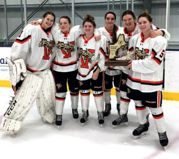Vermont Academy's captains show off their well-deserved hardware.