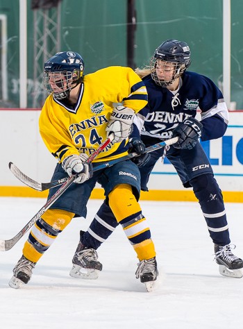 Nobles 8th grade D Jenna MacDonald has a BB&N attacker tied up in Tuesday action at Fenway Park.