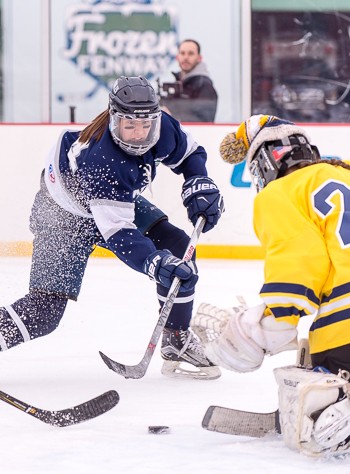 The puck is right there on the doorstep -- and Becca Gilmore has that look in her eyes. Nobles topped BB&N 4-1 at Fenway Park on Tuesday.