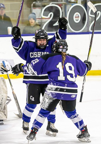 Cushing sophomore Madelyn Soderquist (#4) celebrates with senior Courtney Lilley (#19) after scoring the first of her two goals in Cushing's 4-1 win v