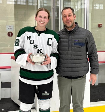 Julia Pellerin '23, New Hampton forward and Small School MVP, with head coach Craig Churchill.